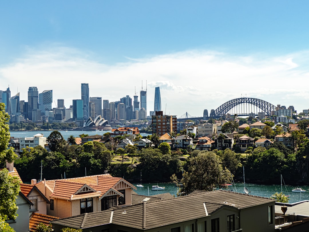 a view of a city with a bridge in the background